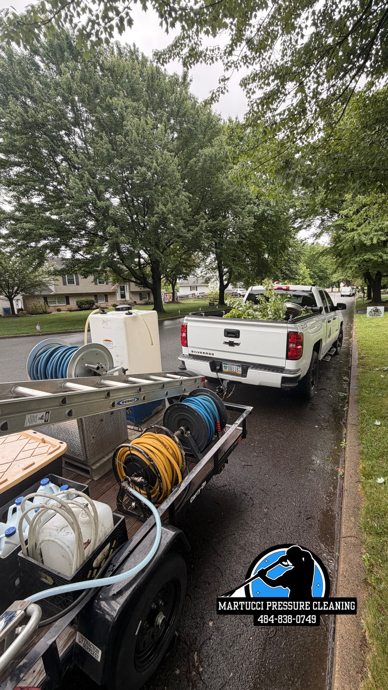 Martucci Pressure Cleaning truck and equipment trailer on a Lehigh Valley job site